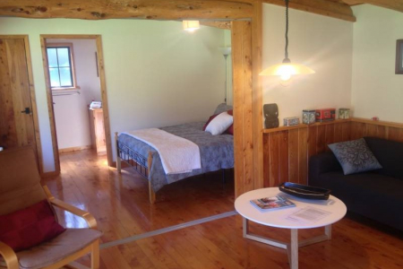 The Cottage bedroom and living area 